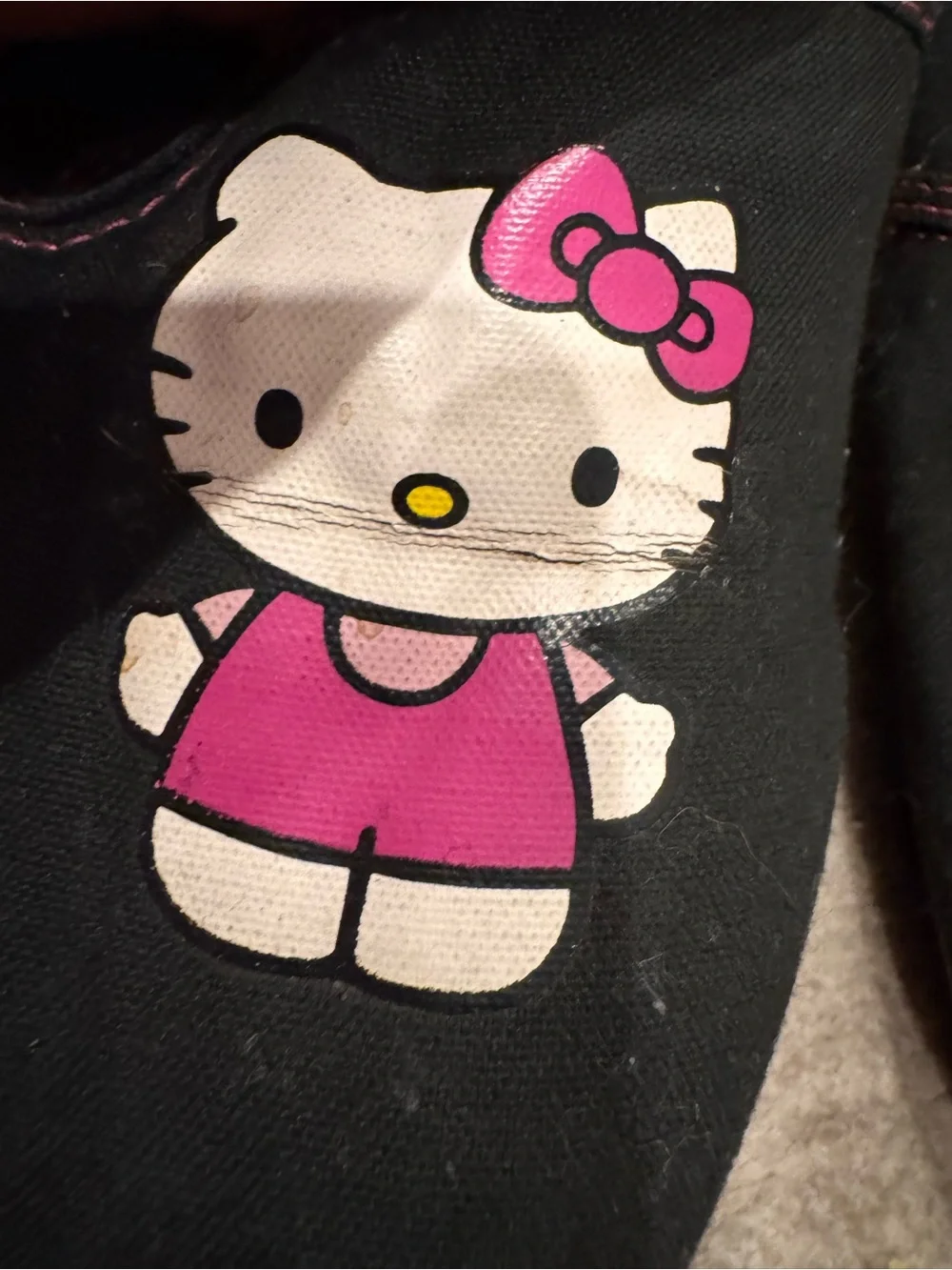 Vans Sanrio Black and Pink Hello Kitty Slip-On Shoes
